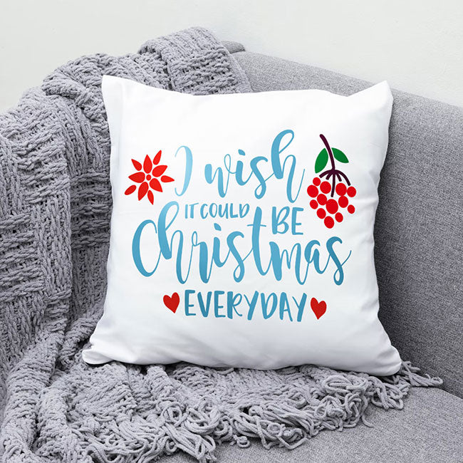 Finished DTF transfer on a black t-shirt showing a colorful holiday heart design