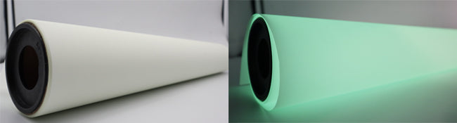 Side-by-side glow-in-the-dark DTF film roll in normal light and glowing green in the dark